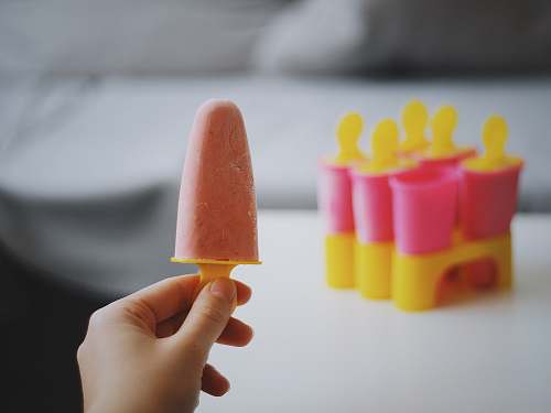 ice pop person holding Popsicle ice cream lolly